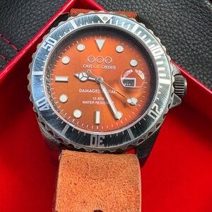 Vintage out of order burnt orange men’s watch